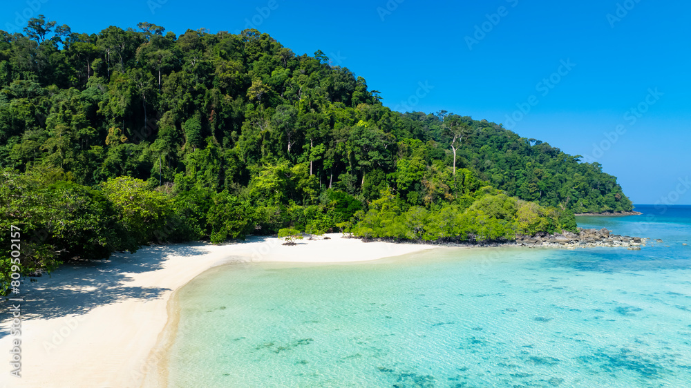 white sand beach tropical with seashore as the island in a coral reef ,blue and turquoise sea Amazing nature landscape with blue lagoon