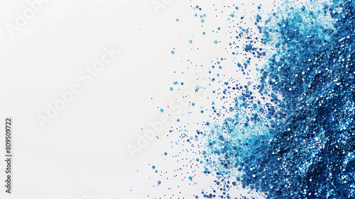 splashes of blue glitter powder on white background