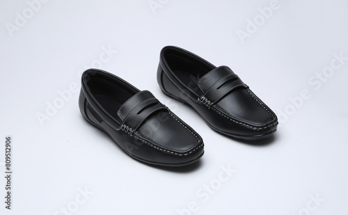 black leather loafers slip on shoes isolated