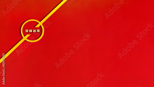 赤い背景で左上隅にかかったストップマークのリボン photo