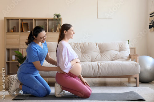 Pregnant woman receiving ba...