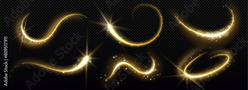Gold magic star trail with glitter and light dust. Golden particle glow effect on black background. Abstract swirl line with shimmer and sparkle motion element. Festive Christmas confetti and stardust