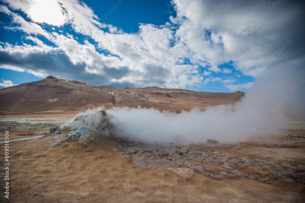 Amazing lava field in the highlands of Iceland near Myvatn, black old lava flows and volcanic rocks, mountains in the background Amazing lava field in the highlands of Iceland near Myvatn, black old lava flows and volcanic rocks, mountains in the background