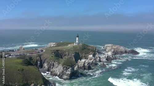 Yaquina Head Lighthouse Newport Oregon Coast. Aerial view from distance. photo