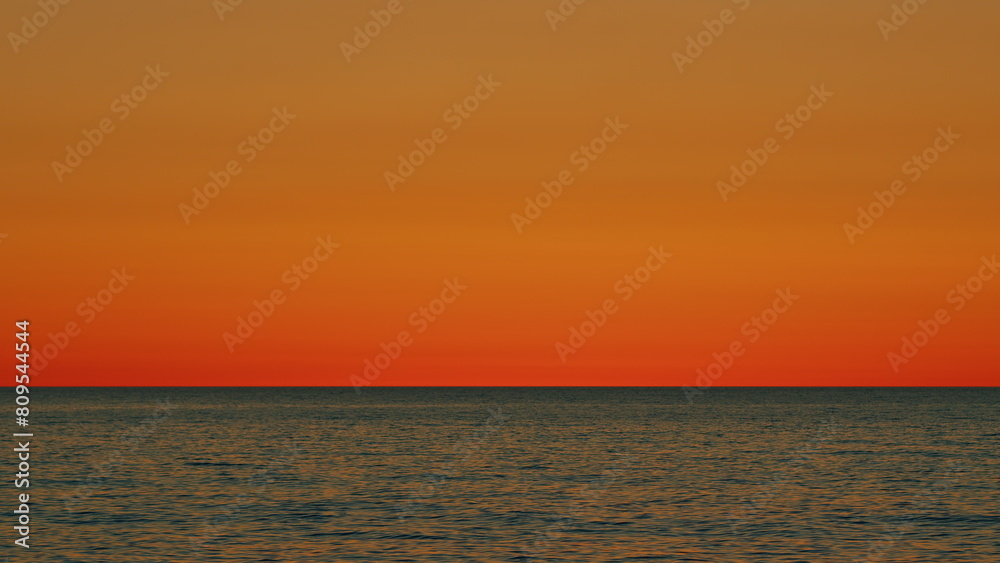 Amazing Scene Sunset Tropical Sea. Bright Sun Over Sea. Sunrise Over Sea. Golden Shimmering Sea Waves In Sun. Slow motion.