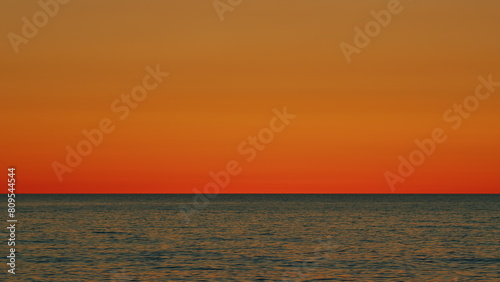 Amazing Scene Sunset Tropical Sea. Bright Sun Over Sea. Sunrise Over Sea. Golden Shimmering Sea Waves In Sun. Slow motion.