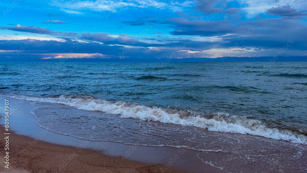 Big waves. stormy sea, thunderclouds. Kyrgyzstan, Lake Issyk-Kul Big waves. stormy sea, thunderclouds. Kyrgyzstan, Lake Issyk-Kul