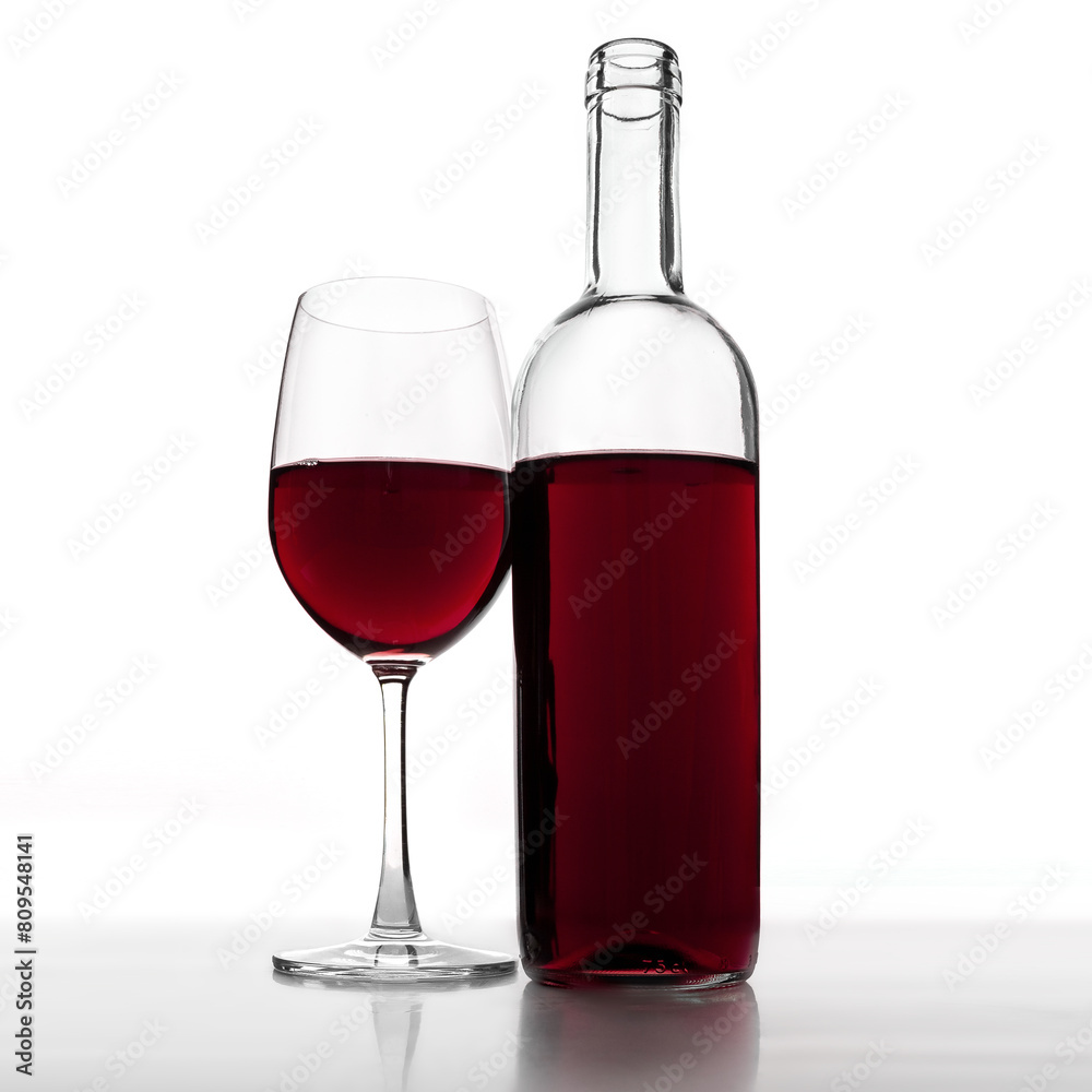 Red wine bottle and glass isolated on white background Red wine bottle and glass isolated on white background