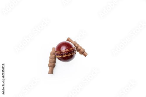Cricket ball and bails isolated on white background