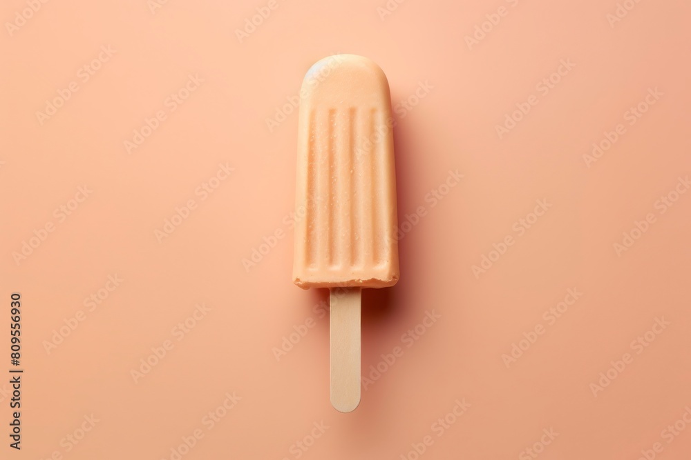 Yellow ice cream stick on pink background. Minimal summer concept. Yellow ice cream stick on pink background. Minimal summer concept.