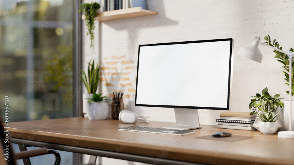 A contemporary minimalist home office features a computer mockup against a white rustic brick wall. A contemporary minimalist home office features a computer mockup against a white rustic brick wall.