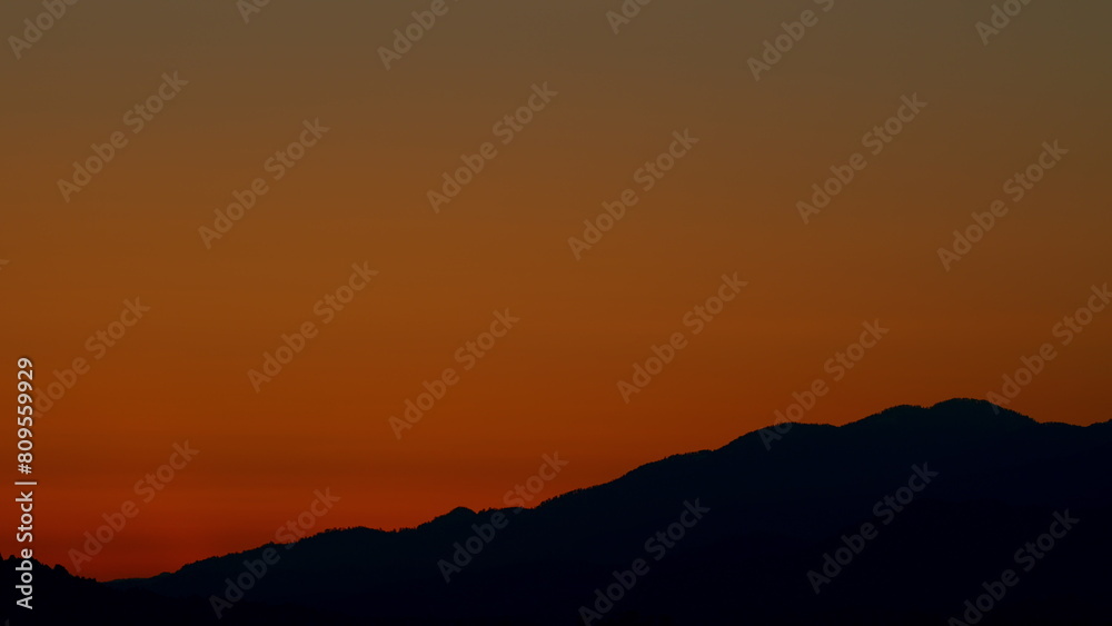 Landscape Colorful Sky At Sunrise. Nature Mountain Sky And Clouds Sunrise Concept. Timelapse.
