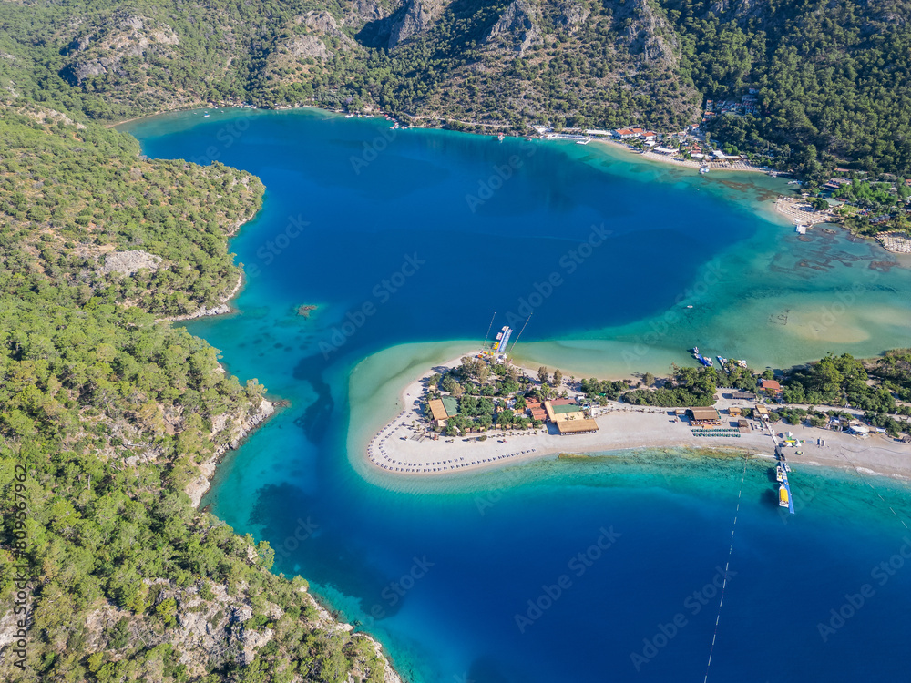 Fototapeta premium Oludeniz beach and boats waiting on the beach enjoy the turquoise sea