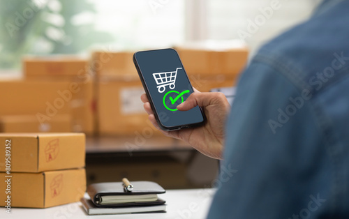person confirm order on smartphone application online shopping  and preparation at store, small business concept