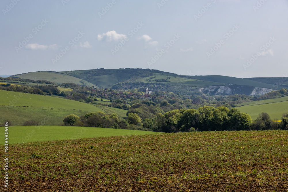 Fototapeta premium Looking towards Lewes from farmland near Falmer, on a sunny spring day