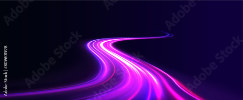 Long exposure of motorways as speed. Neon spiral lines in yellow blue and purple colors. Image of speed motion on the road. 