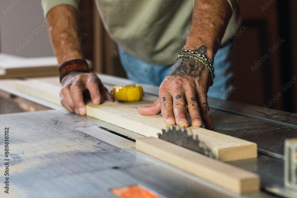 Cutting a piece of wood Cutting a piece of wood