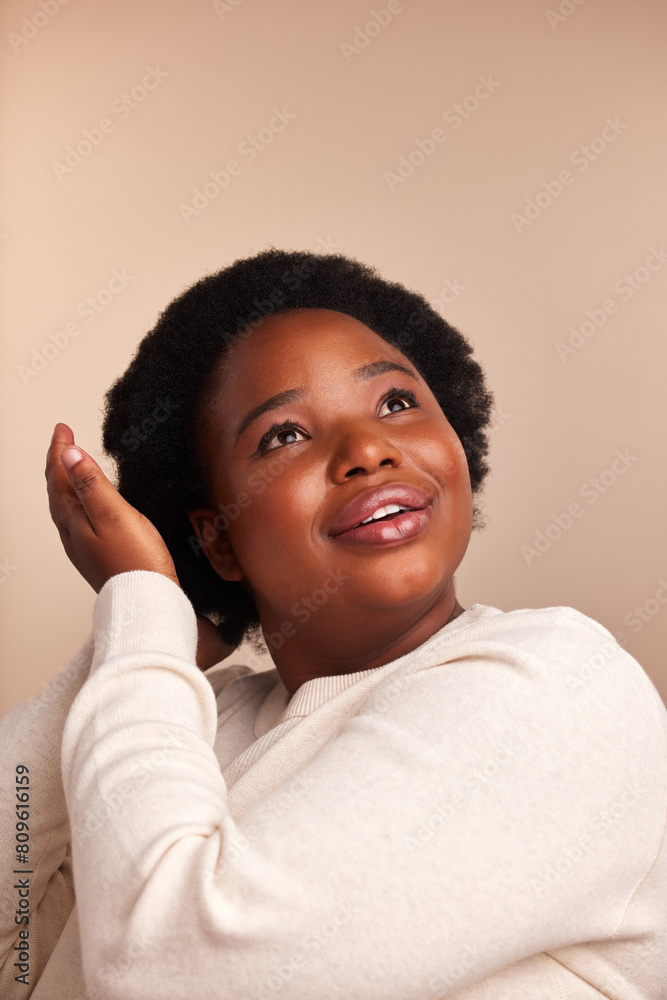 Black woman, thinking and afro care in studio with pride, happy and haircare on beige background. Beauty, female person and clean routine for wellness, conditioner and hot oil treatment and results Black woman, thinking and afro care in studio with pride, happy and haircare on beige background. Beauty, female person and clean routine for wellness, conditioner and hot oil treatment and results