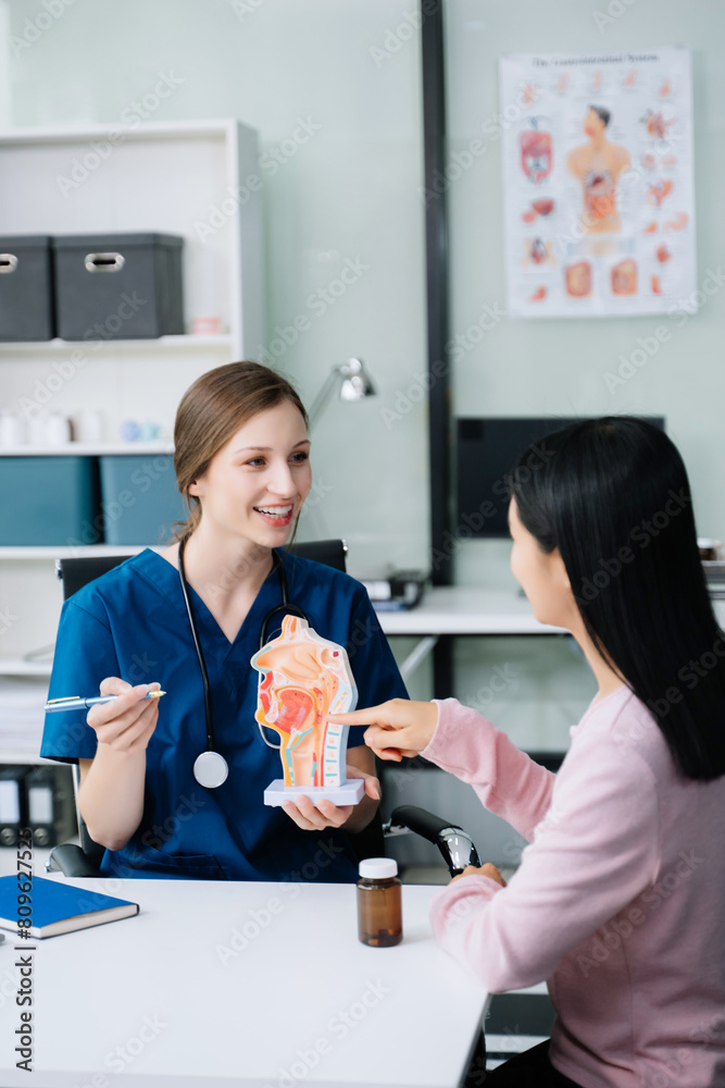 Portrait of female doctor explaining diagnosis to her patient. Doctor Meeting With Patient In Exam Room Portrait of female doctor explaining diagnosis to her patient. Doctor Meeting With Patient In Exam Room