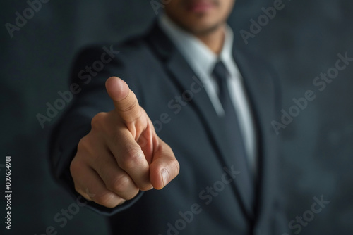 Businessman pointing finger in front side