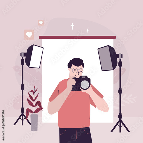 Photographer man. Photo equipment. Studio interior with accessories, light box and reflector. Male character with camera. Studio photography. Freelancer artist close up view. f