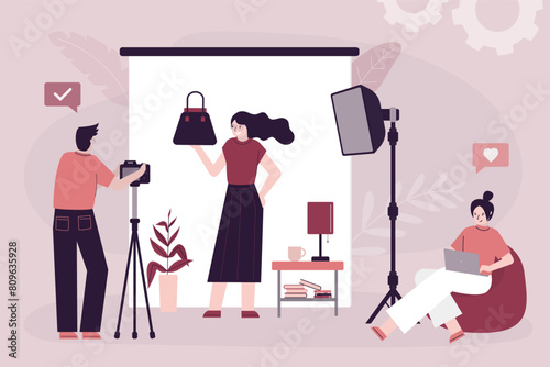 Professional photographer or photo artist shooting model with bag for advertising and magazine. Photographing and creative occupation, working process. Photo studio, creative team.