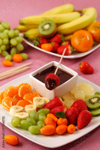 Fruit stick with chocolate.