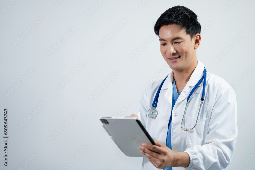 Doctor working on a digital tablet in hospital. Doctor working on a digital tablet in hospital.