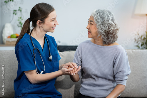 Female doctors shake hands with patients encouraging each other  To offer love, concern, and encouragement while checking the patient's health. concept of medicine photo