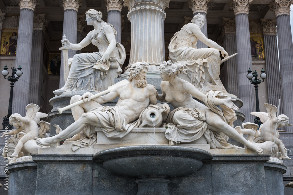 The base of the Athena Fountain at the Austrian Parliament, Vienna, Austria. The base of the Athena Fountain at the Austrian Parliament, Vienna, Austria.