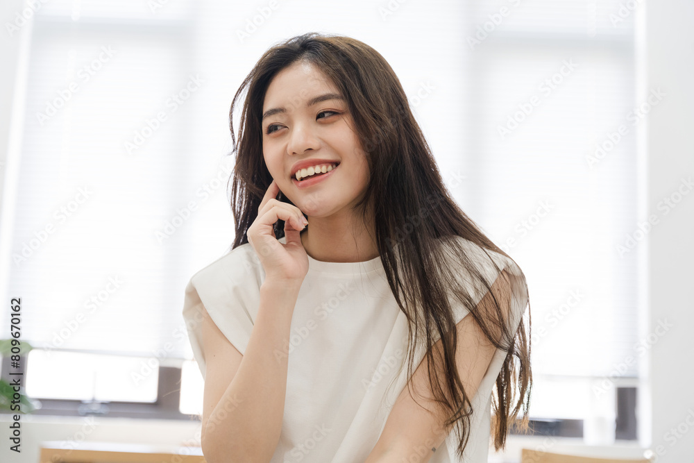 Portrait of beautiful young Asian girl at home Portrait of beautiful young Asian girl at home