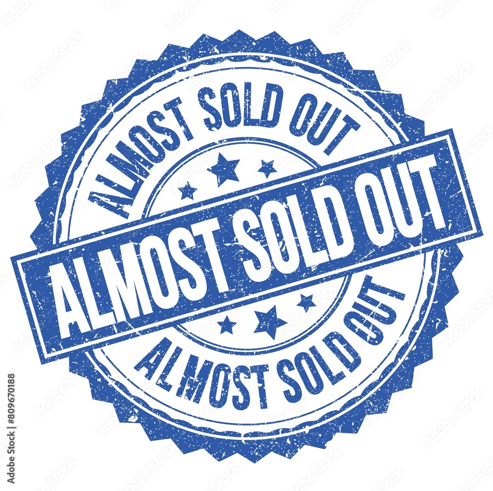 Obraz premium ALMOST SOLD OUT text on blue round stamp sign