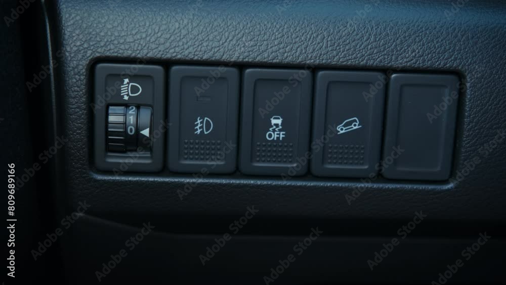 Anti lock braking system. A view of person hands push the button of ABS in the modern car. Anti lock braking system. A view of person hands push the button of ABS in the modern car.