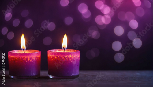 Spiritual Essence  Flaming Pink Candles Illuminate Blurred Purple Space with Bokeh