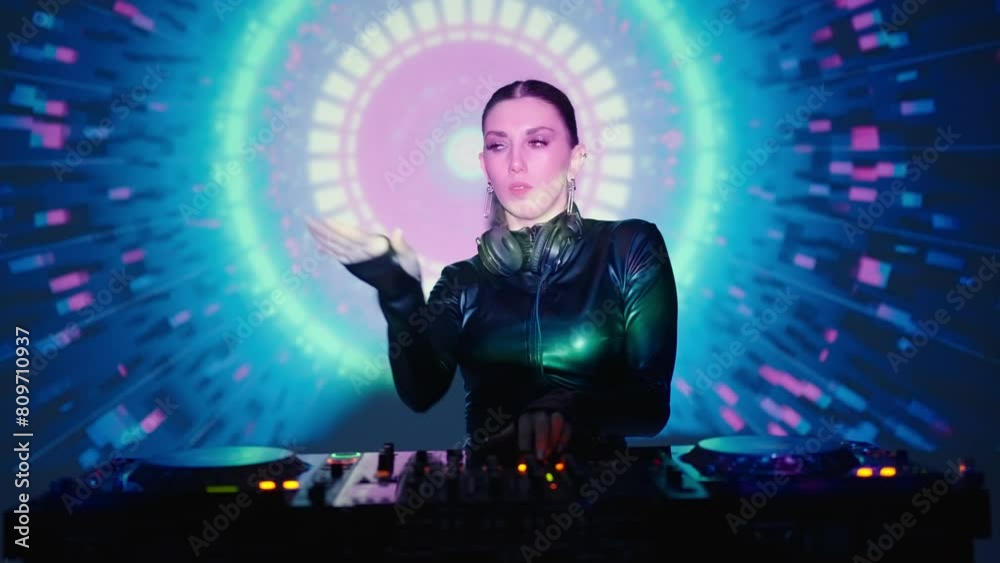 Psychedelic Music In Nightclub, Woman DJ Playing Tracks And Dancing In Darkness With Neon Lights