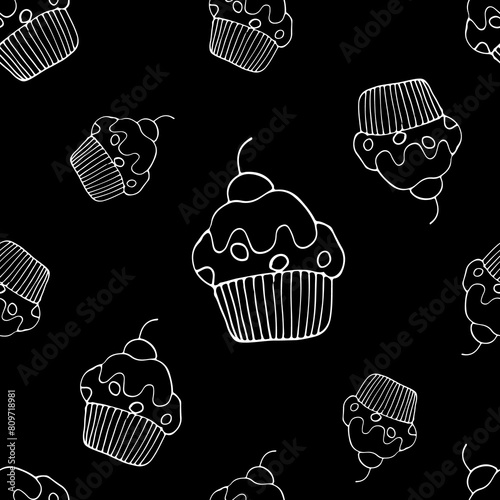 Cupcakes doodles repeat pattern, a chalkboard style seamless background with hand-drawn muffins, a white-on-black drawing