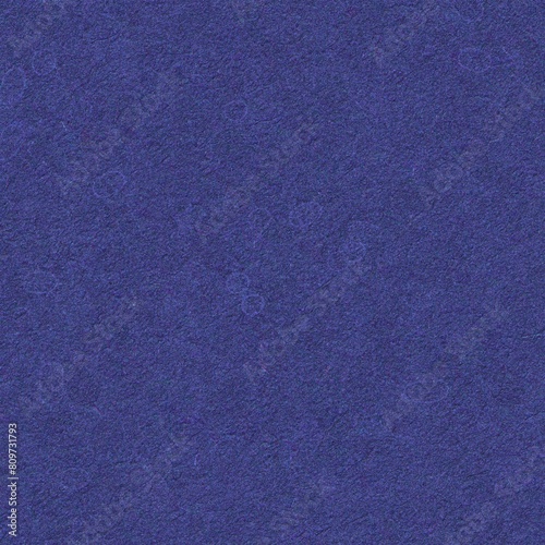 Dark blue rough background with textured surface close-up