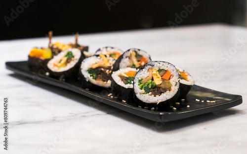 Korean Seaweed Rice Rolls or Kimbap Korean dish made from steamed white rice and various other ingredients