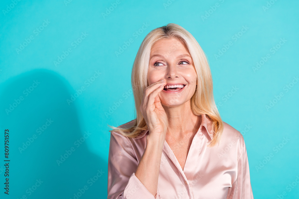 Photo of pretty elegant lady communicate empty space wear shirt isolated on teal color background Photo of pretty elegant lady communicate empty space wear shirt isolated on teal color background