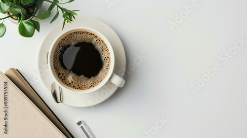 Cup of coffee with notebooks on white background