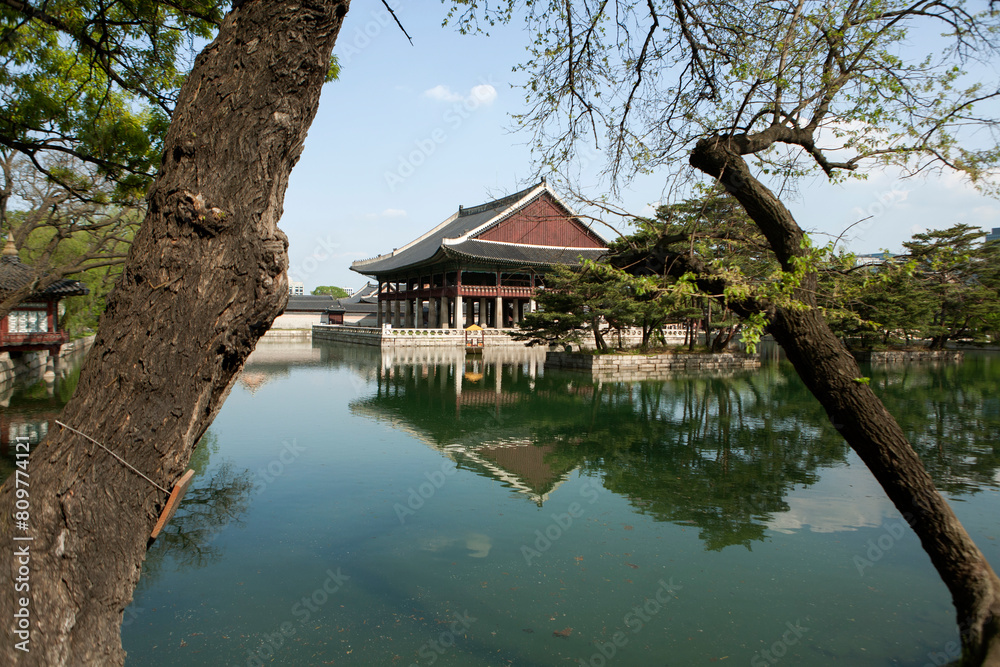 View of the traditional wooden pavilion on the lake in the palace View of the traditional wooden pavilion on the lake in the palace