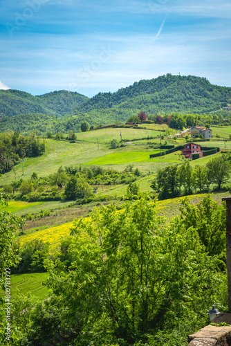 springtime panorama of the hills of oltrepo pavese, vinery area in italy (lombardy region) at the borders with piedmont and emilia romagna. it's famous for valuables wines, mainly sparkling wines. photo