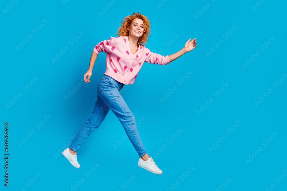 Obraz premium Full body photo of pretty young girl excited running wear trendy pink outfit isolated on blue color background