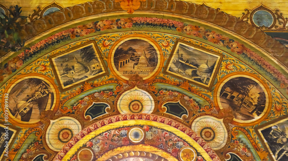 Colorful Paintings of Buddhist Vihara on Ceiling of Gangaramaya Temple, Colombo, Sri Lanka.