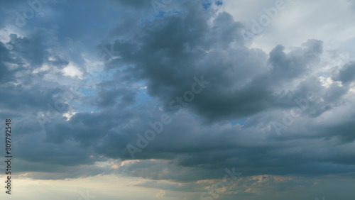 Sky before storm. Stormy cloudy sky wide panorama. Storm cloudy dramatic sky with dark rain grey cumulus cloud and blue sky. Timelapse.
