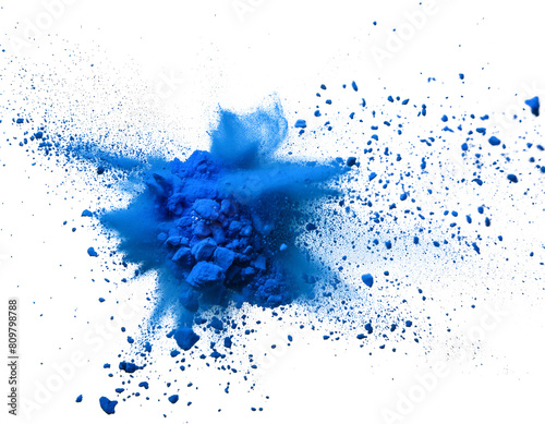 Explosion of blue powder against a dark background