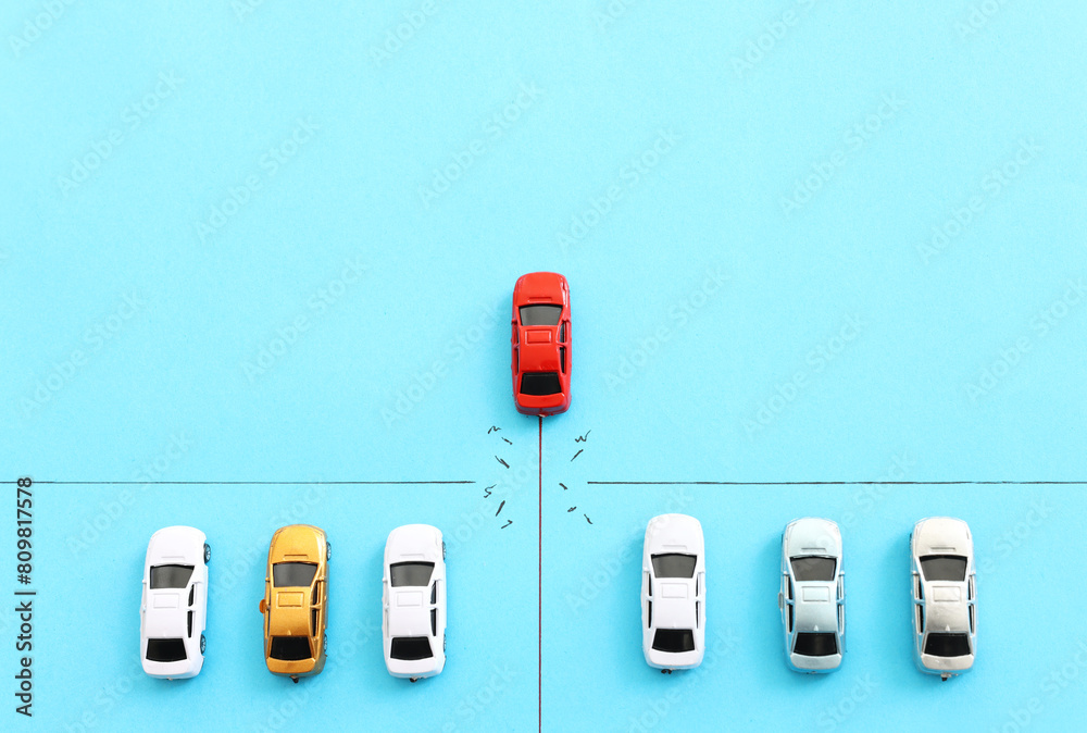 Concept image of challenge and teamwork. Red car leading the group Concept image of challenge and teamwork. Red car leading the group