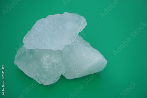 Crystal white alum stones or Potassium alum. Useful for beauty and spa treatment. Use to treat body odor under the armpits as deodorant and make water clear.  