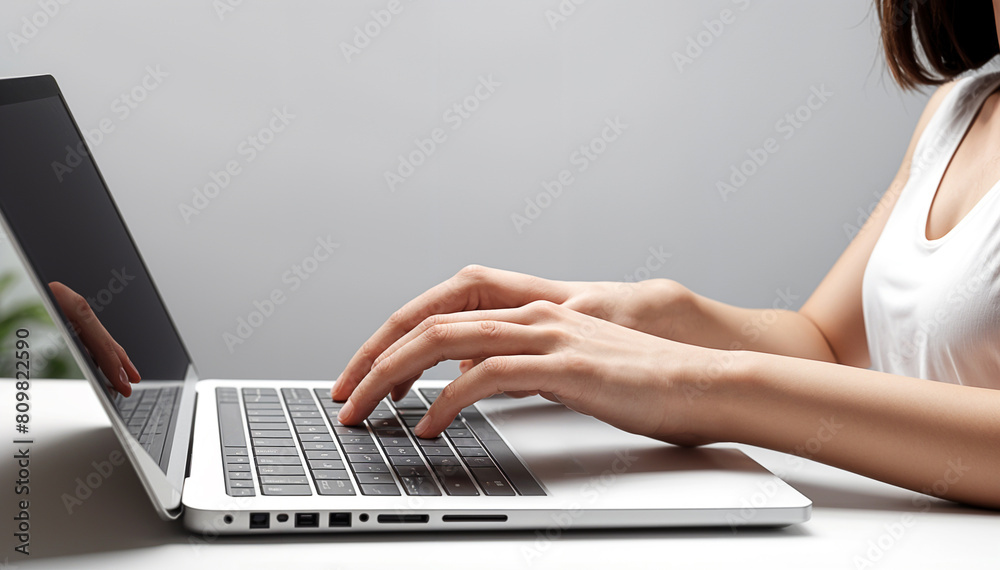 Fototapeta premium person typing on laptop