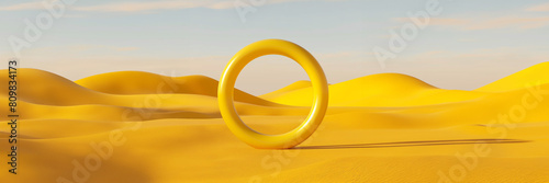 Surreal abstract dunes landscape with yellow ring object in the centre. photo